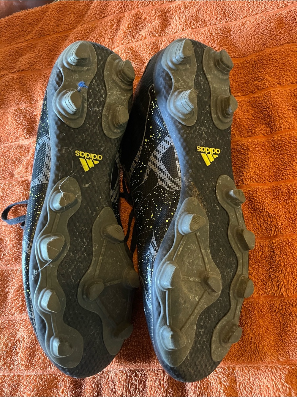adidas Men’s Black Soccer Cleats with Yellow Accents